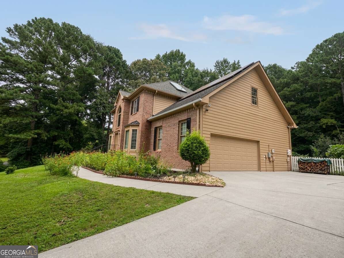 5 bedroom, 4 bathroom, 4,400 sq ft single family residence for sale at 2365 Friars Gate Drive, Lawrenceville, GA 30043 — photo 3