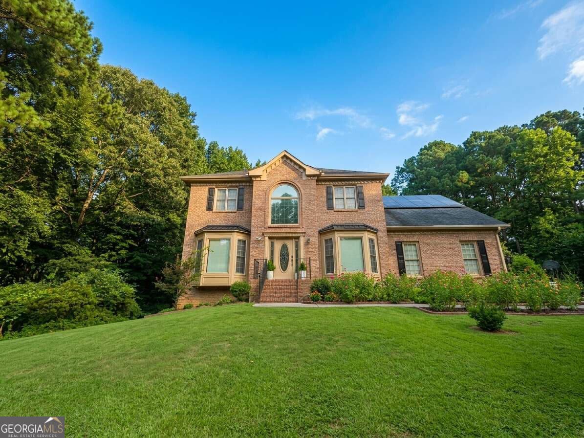 5 bedroom, 4 bathroom, 4,400 sq ft single family residence for sale at 2365 Friars Gate Drive, Lawrenceville, GA 30043 — photo 1 of 24