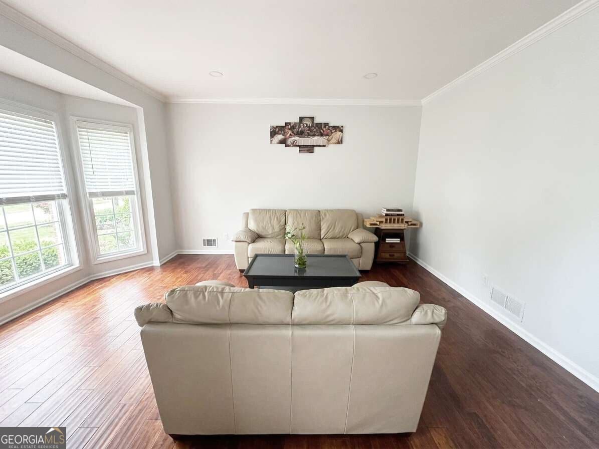 5 bedroom, 4 bathroom, 4,400 sq ft single family residence for sale at 2365 Friars Gate Drive, Lawrenceville, GA 30043 — photo 9