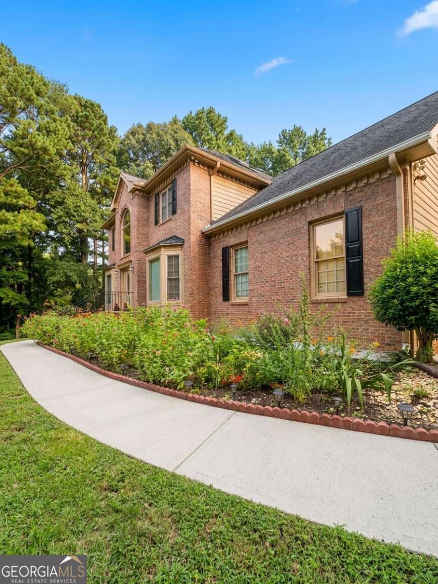 5 bedroom, 4 bathroom, 4,400 sq ft single family residence for sale at 2365 Friars Gate Drive, Lawrenceville, GA 30043 — photo 4