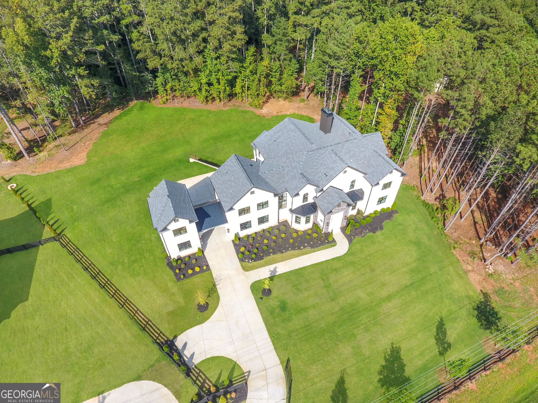 6 bedroom, 7 bathroom, 10,200 sq ft single family residence for sale at 15794 Thompson Road, Milton, GA 30004 — photo 2