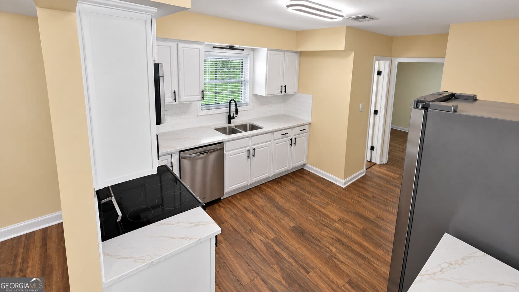 4 bedroom, 2.5 bathroom, 1,998 sq ft single family residence for sale at 10685 Sandpiper Road, Jonesboro, GA 30238 — photo 10
