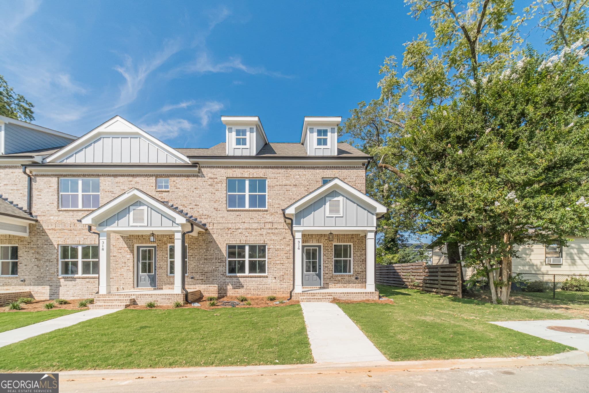 4 bedroom, 2.5 bathroom, 1,783 sq ft townhouse for sale at 316 Milledge Avenue, Monroe, GA 30655 — photo 1 of 34