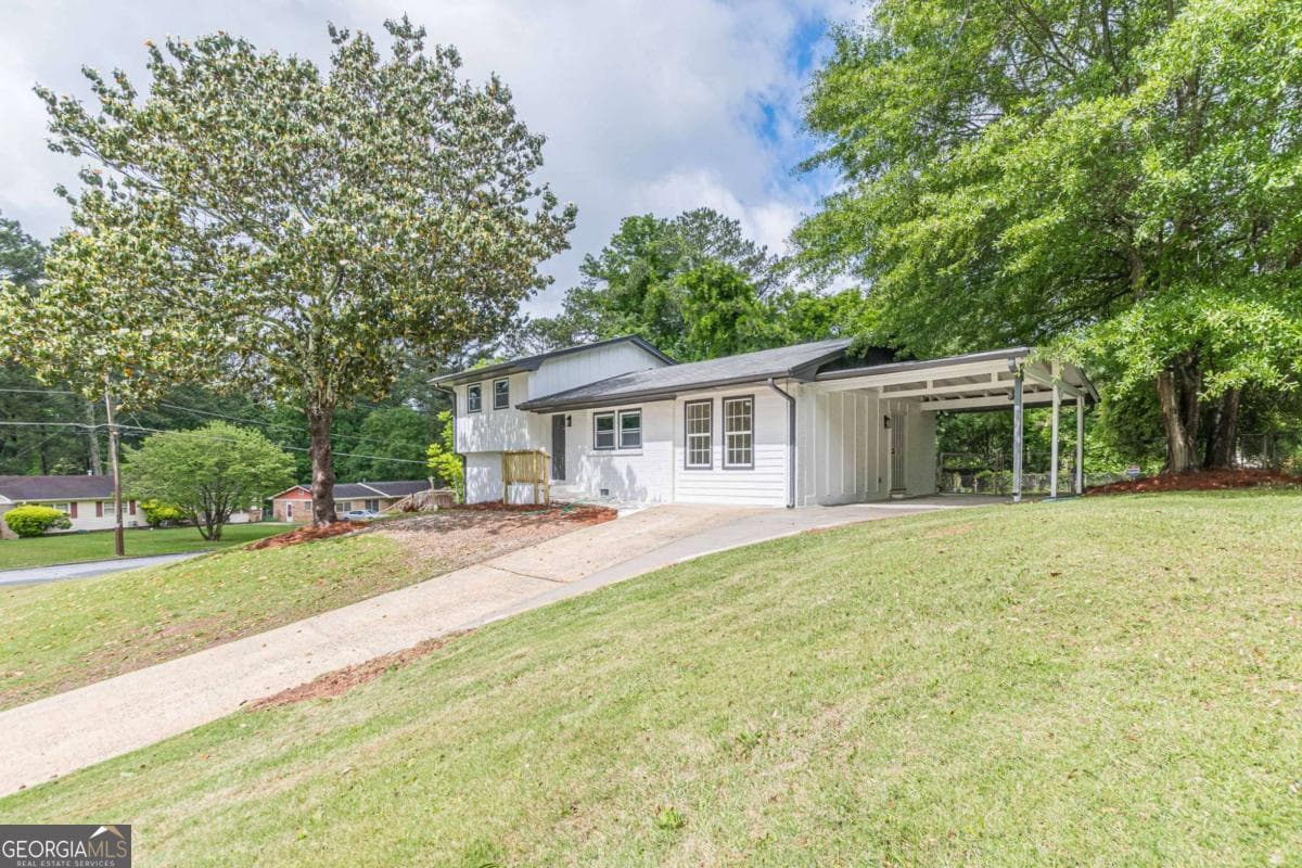 4 bedroom, 2 bathroom single family residence for sale at 8285 Hemlock Drive, Jonesboro, GA 30238 — photo 3