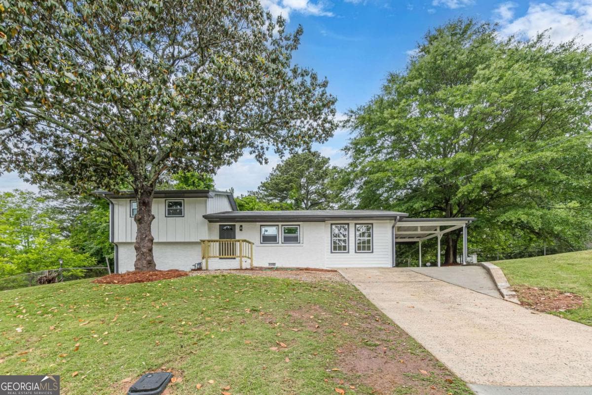 4 bedroom, 2 bathroom single family residence for sale at 8285 Hemlock Drive, Jonesboro, GA 30238 — photo 4