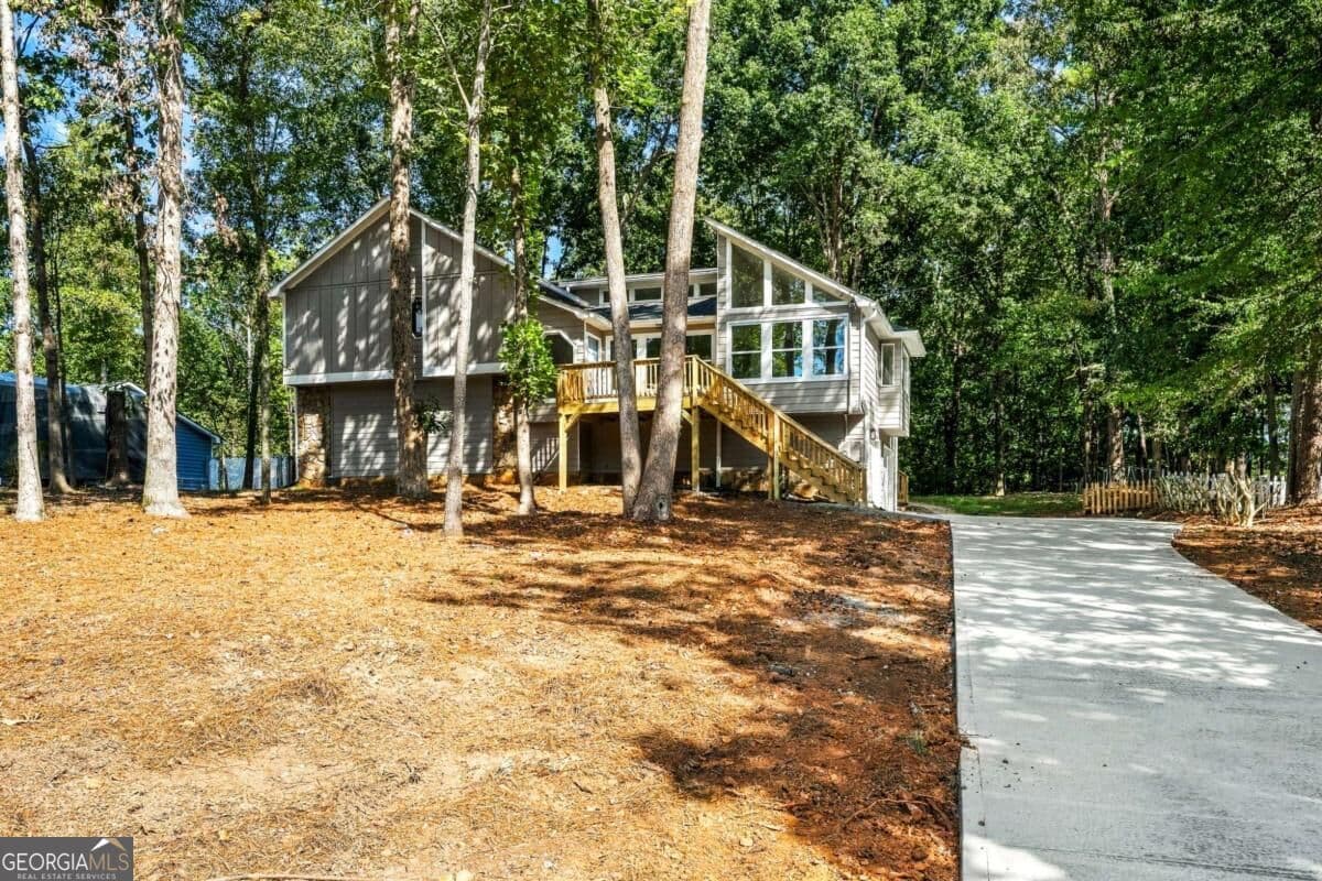 5 bedroom, 4 bathroom, 4,066 sq ft single family residence for sale at 745 Cedar Creek Way, Woodstock, GA 30189 — photo 2