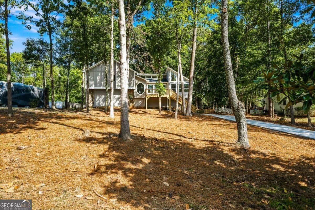 5 bedroom, 4 bathroom, 4,066 sq ft single family residence for sale at 745 Cedar Creek Way, Woodstock, GA 30189 — photo 3