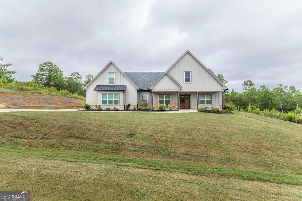 4 bedroom, 3 bathroom, 3,561 sq ft single family residence for sale at 216 Creekside Trail, Forsyth, GA 31029 — photo 6