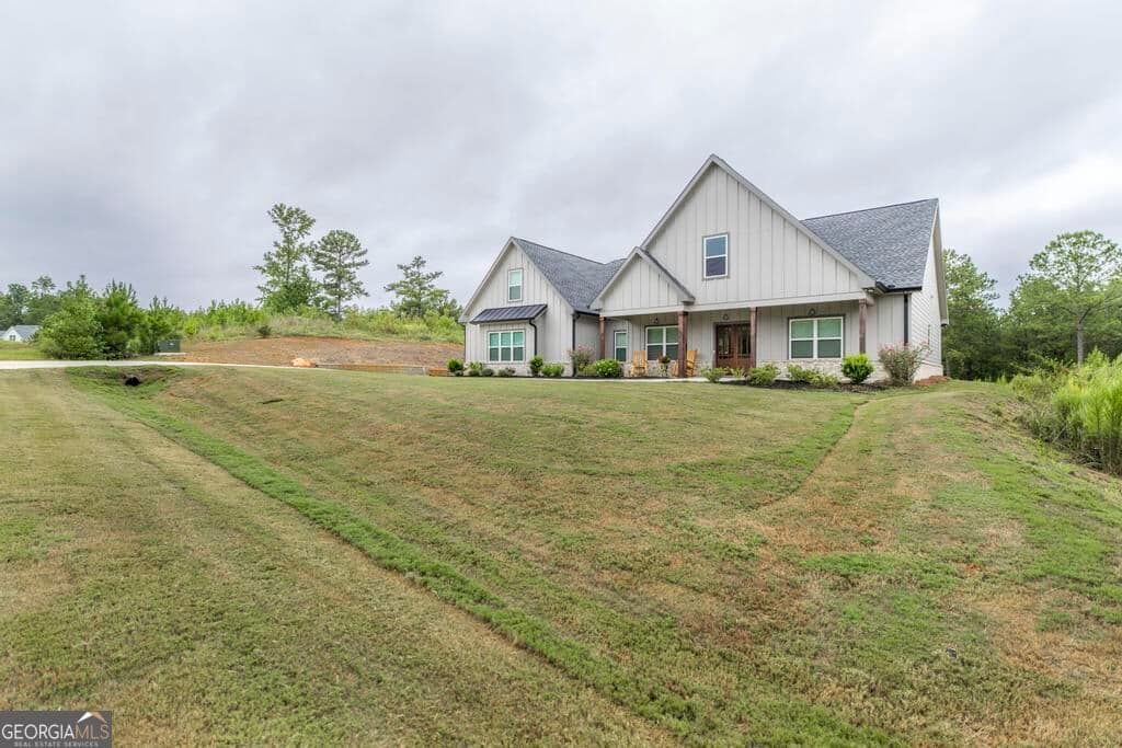 4 bedroom, 3 bathroom, 3,561 sq ft single family residence for sale at 216 Creekside Trail, Forsyth, GA 31029 — photo 7