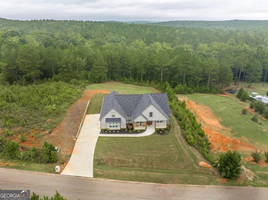 4 bedroom, 3 bathroom, 3,561 sq ft single family residence for sale at 216 Creekside Trail, Forsyth, GA 31029 — photo 3