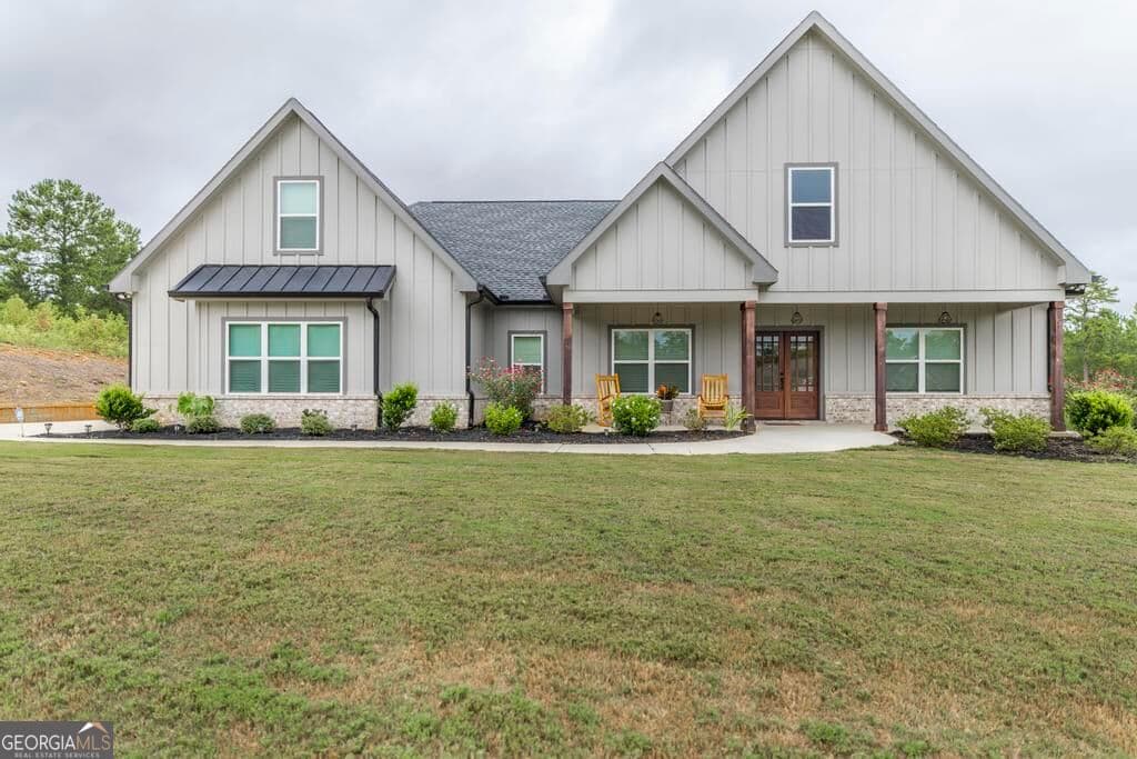4 bedroom, 3 bathroom, 3,561 sq ft single family residence for sale at 216 Creekside Trail, Forsyth, GA 31029 — photo 1 of 46