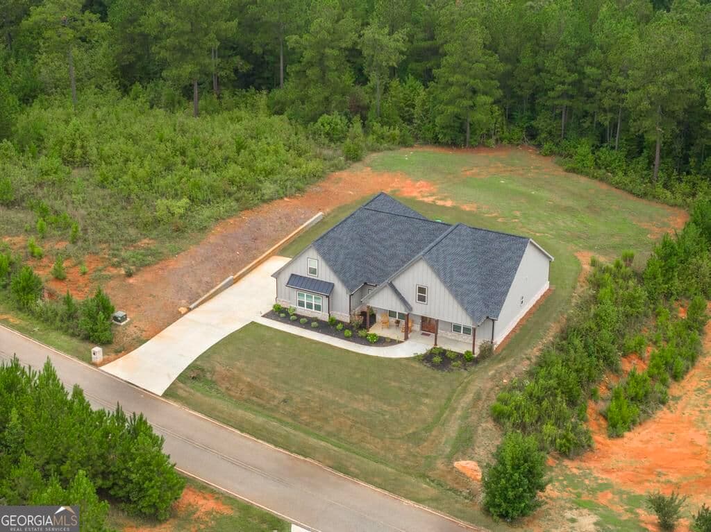 4 bedroom, 3 bathroom, 3,561 sq ft single family residence for sale at 216 Creekside Trail, Forsyth, GA 31029 — photo 4