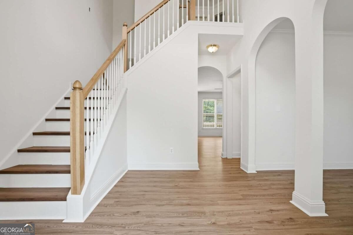 4 bedroom, 2.5 bathroom, 2,648 sq ft single family residence for sale at 4025 Eyrie Farms Lane, Cumming, GA 30041 — photo 2