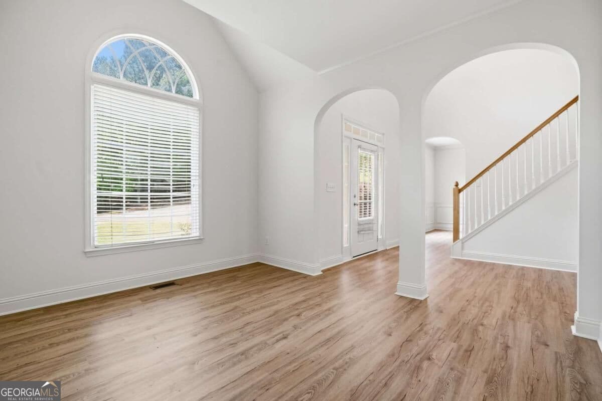 4 bedroom, 2.5 bathroom, 2,648 sq ft single family residence for sale at 4025 Eyrie Farms Lane, Cumming, GA 30041 — photo 3