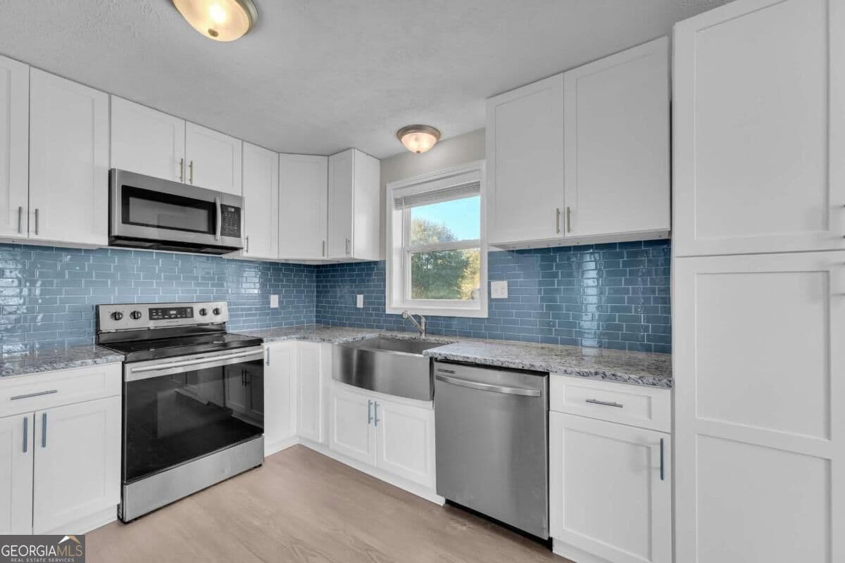 3 bedroom, 2 bathroom, 1,144 sq ft single family residence for sale at 5640 Cleveland Highway, Clermont, GA 30527 — photo 3