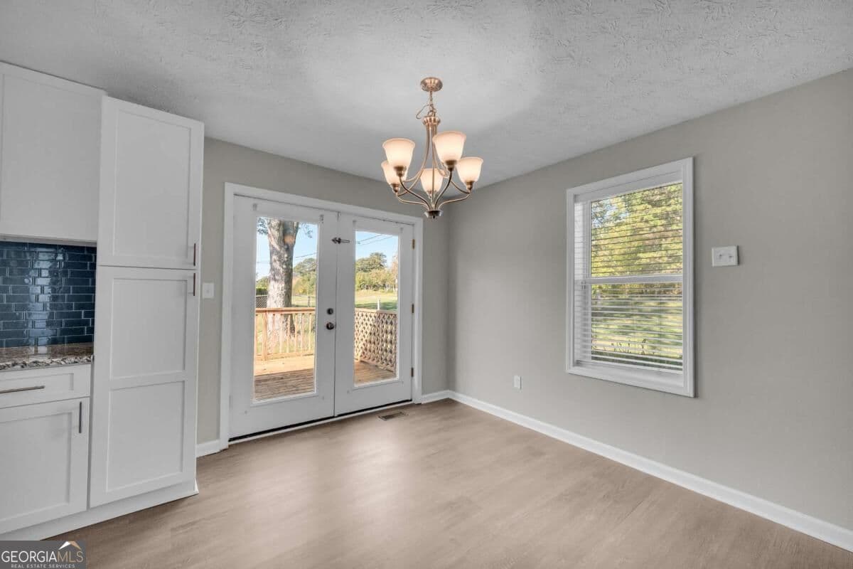 3 bedroom, 2 bathroom, 1,144 sq ft single family residence for sale at 5640 Cleveland Highway, Clermont, GA 30527 — photo 5