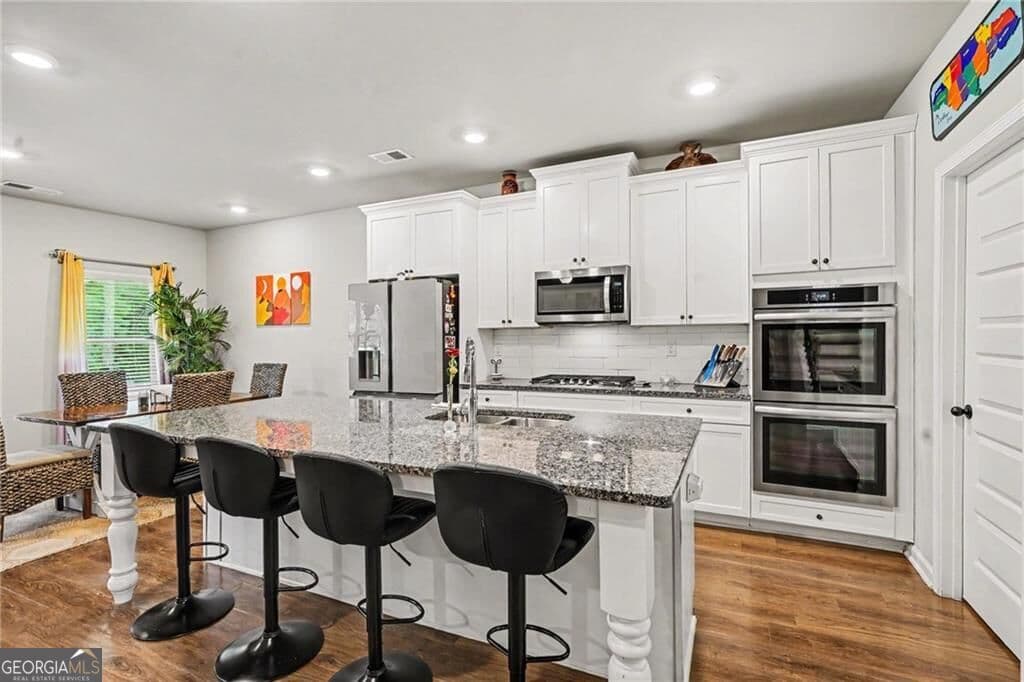 4 bedroom, 4.5 bathroom, 3,719 sq ft single family residence for sale at 521 Redchurch Drive, Mcdonough, GA 30252 — photo 8