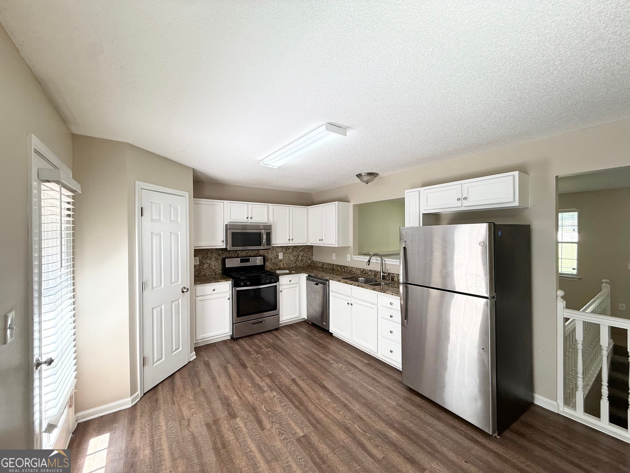4 bedroom, 2 bathroom, 1,750 sq ft single family residence for sale at 7420 BRISTOL Circle, Douglasville, GA 30134 — photo 4