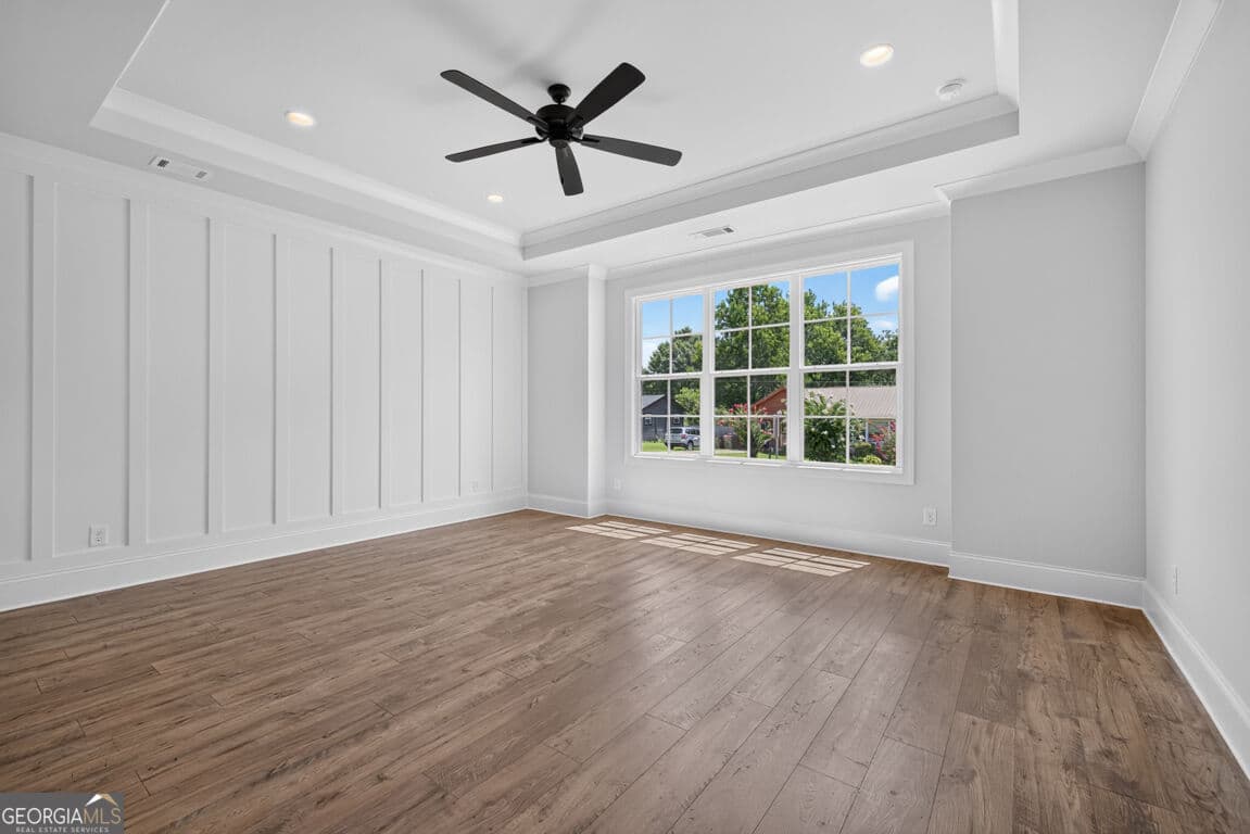 4 bedroom, 3.5 bathroom, 3,112 sq ft single family residence for sale at 5816 Mitchell Street, Flowery Branch, GA 30542 — photo 7