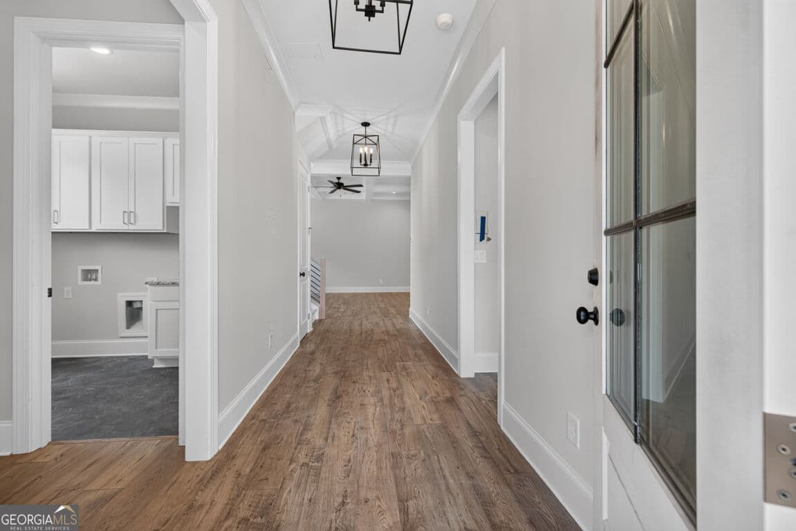 4 bedroom, 3.5 bathroom, 3,112 sq ft single family residence for sale at 5816 Mitchell Street, Flowery Branch, GA 30542 — photo 3