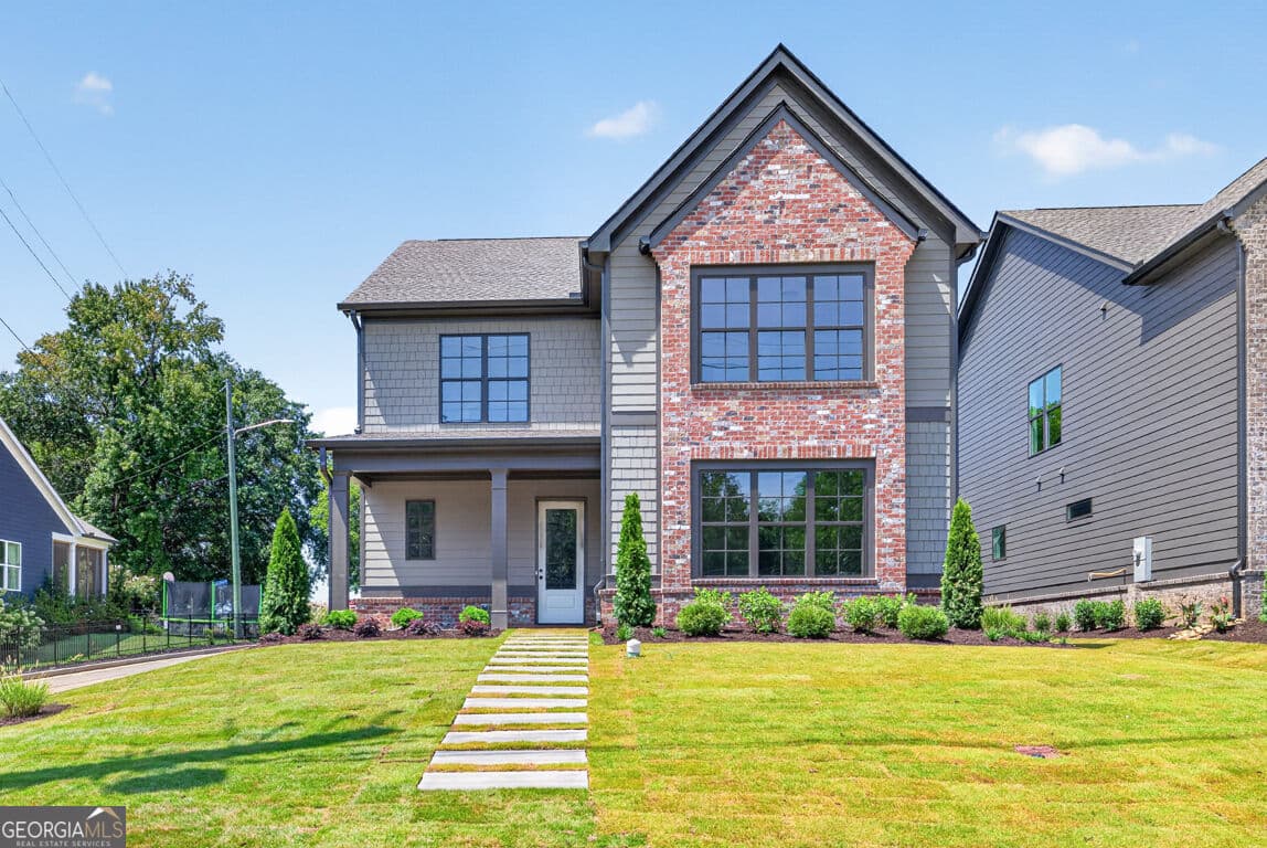 4 bedroom, 3.5 bathroom, 3,112 sq ft single family residence for sale at 5816 Mitchell Street, Flowery Branch, GA 30542 — photo 1 of 127