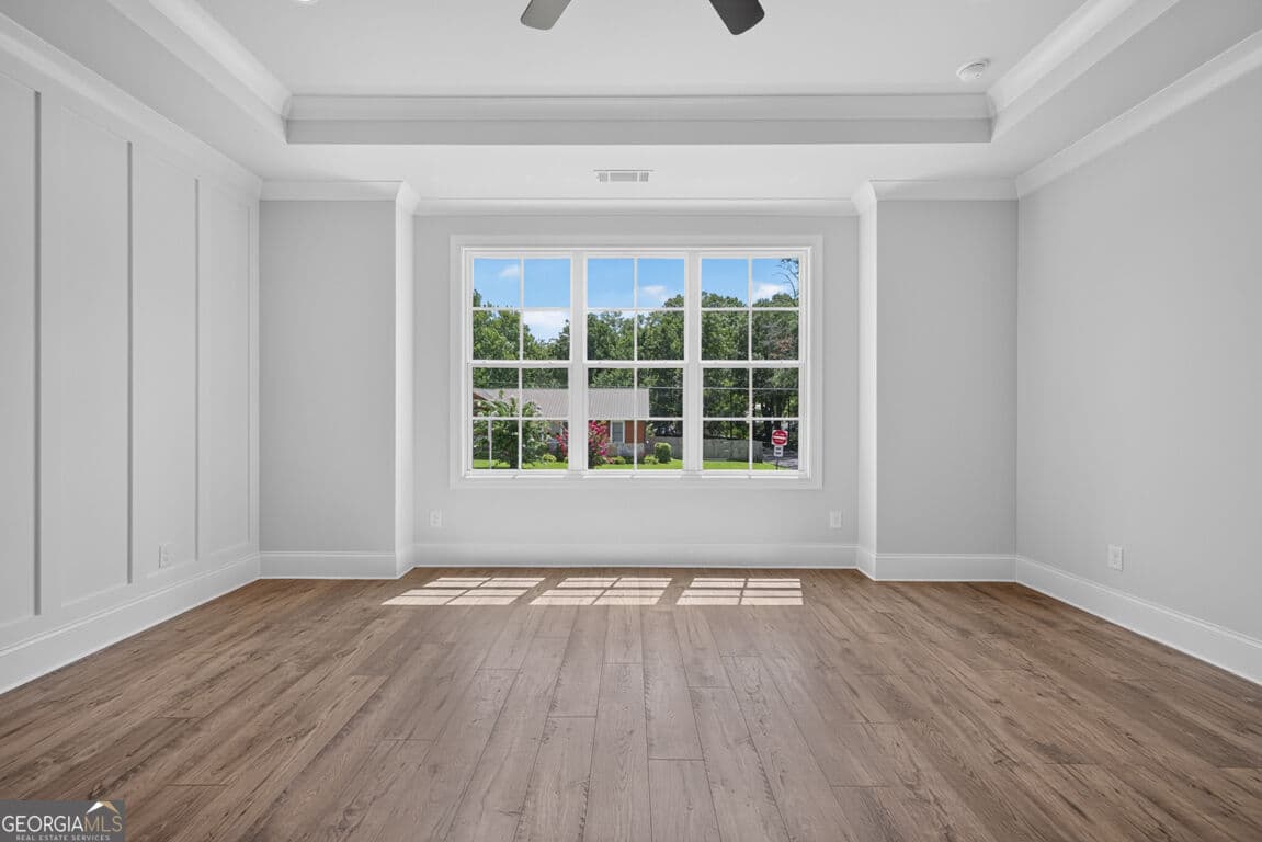 4 bedroom, 3.5 bathroom, 3,112 sq ft single family residence for sale at 5816 Mitchell Street, Flowery Branch, GA 30542 — photo 8