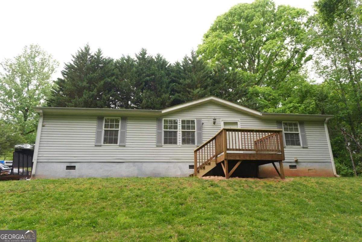 3 bedroom, 2 bathroom, 1,296 sq ft manufactured home,single family residence sold at 517 Bill Anderson Road, Dahlonega, GA 30533
