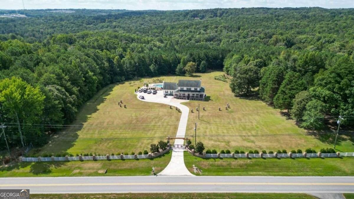 unimproved land for sale at 3616 Thompson Mill Road, Buford, GA 30519 — photo 1 of 74