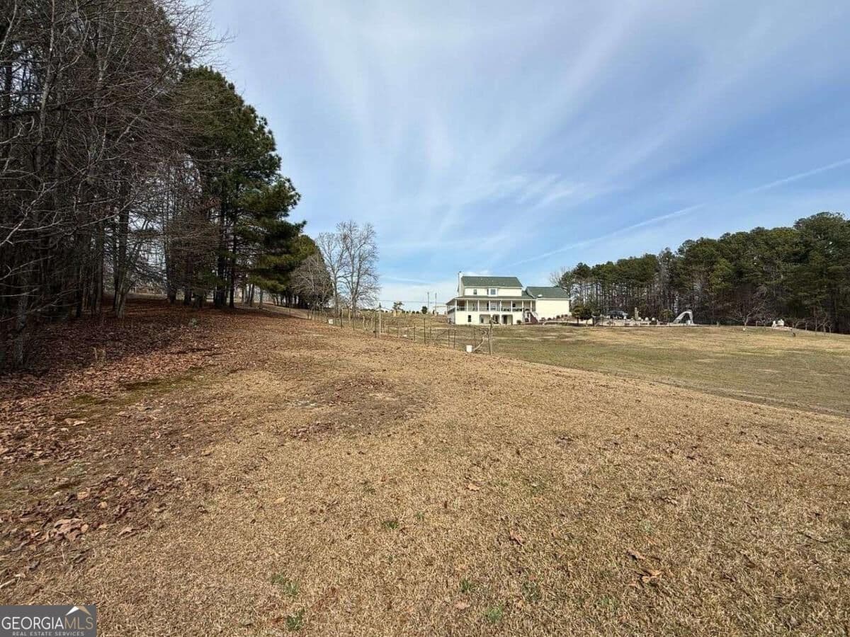 unimproved land for sale at 3616 Thompson Mill Road, Buford, GA 30519 — photo 5