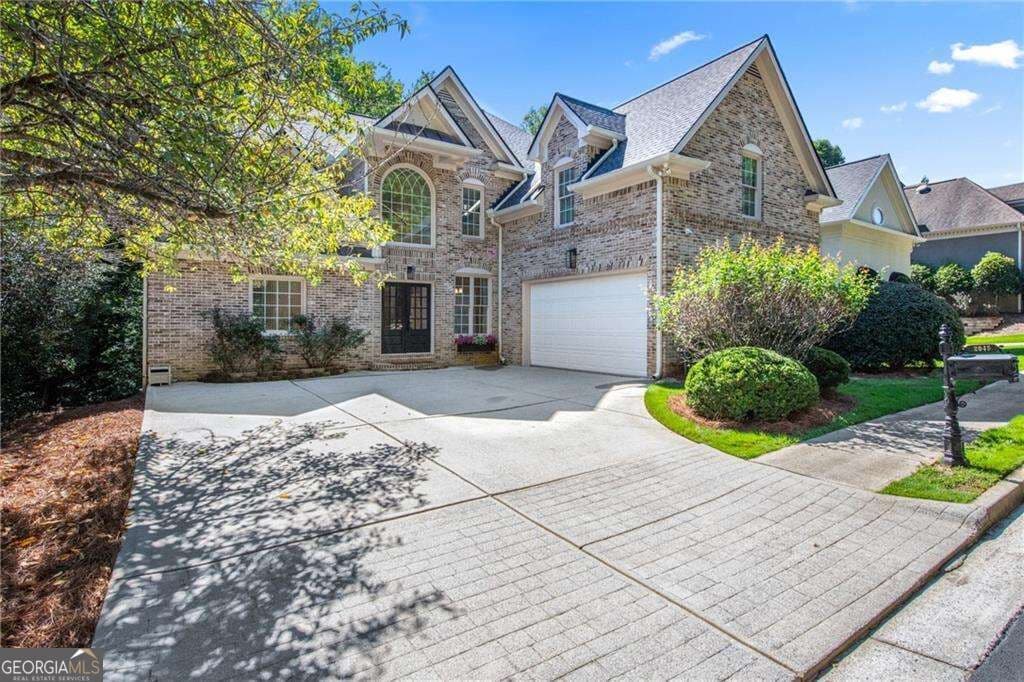 5 bedroom, 4.5 bathroom single family residence for sale at 2045 River Falls Drive, Roswell, GA 30076 — photo 3