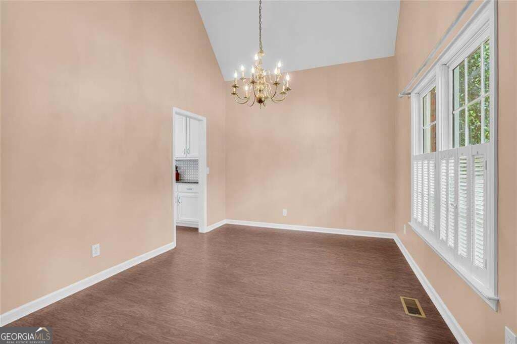 5 bedroom, 3.5 bathroom, 3,756 sq ft single family residence for sale at 214 Kingsley Way, Woodstock, GA 30188 — photo 9