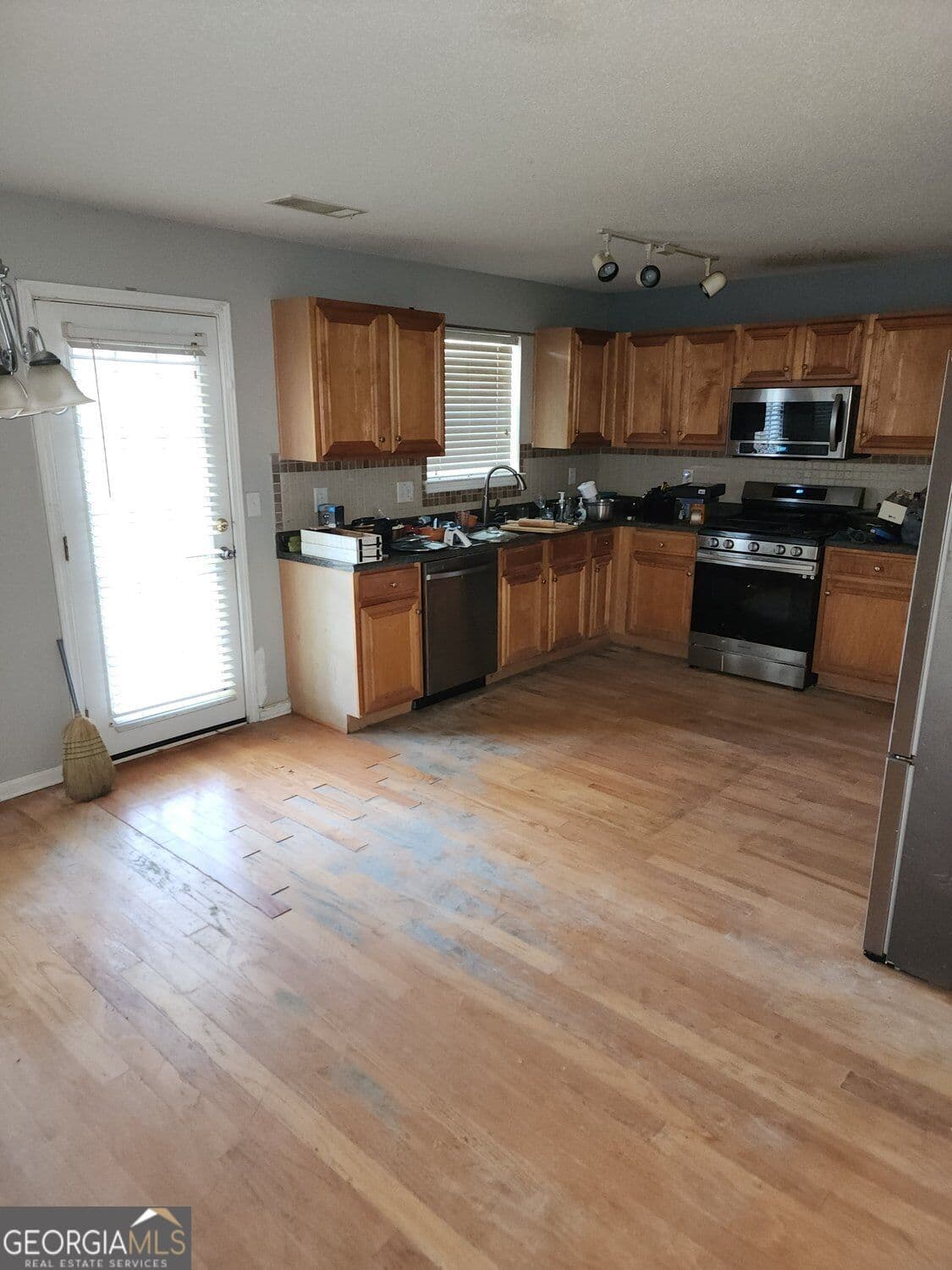4 bedroom, 3 bathroom, 2,620 sq ft single family residence for sale at 6397 Dekeon Drive, South Fulton, GA 30349 — photo 4