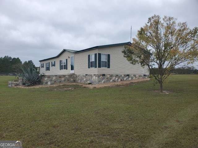 3 bedroom, 2 bathroom, 1,568 sq ft manufactured home,single family residence for sale at 339 Chapel Hill Circle 15, Enigma, GA 31749 — photo 3