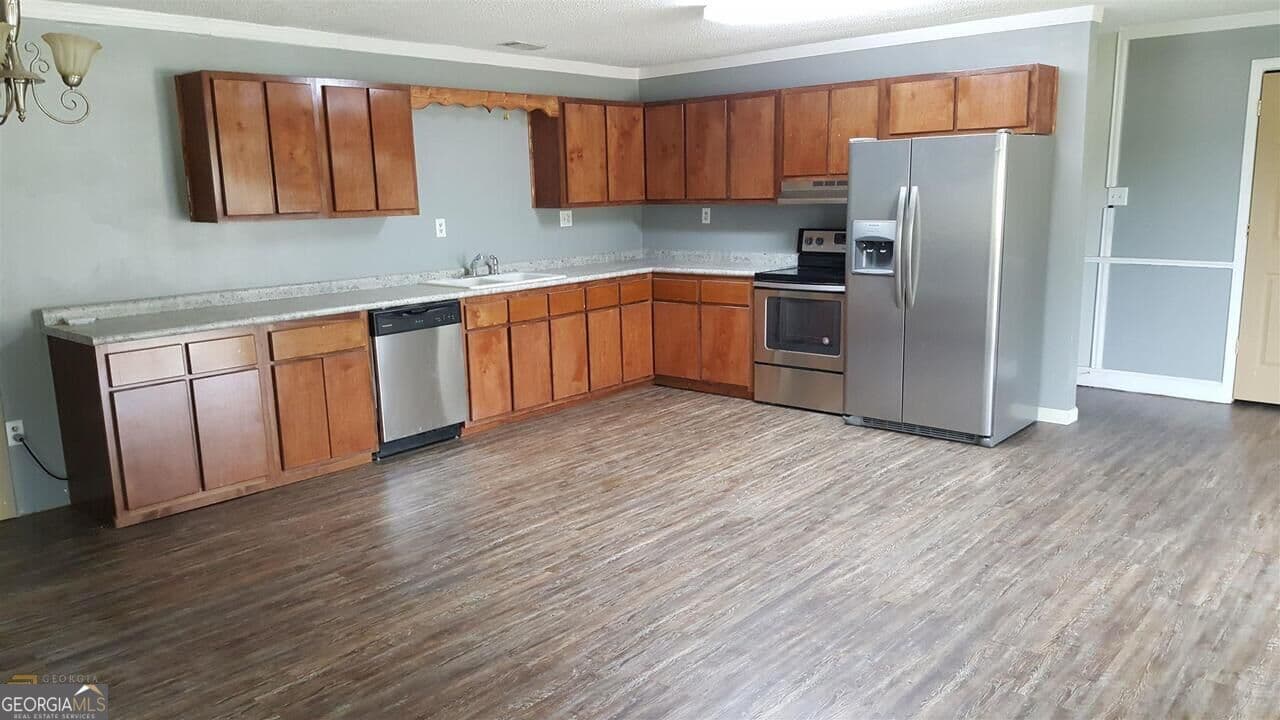 5 bedroom, 2.5 bathroom, 3,276 sq ft single family residence for sale at 7580 Leefield Stilson Road, Brooklet, GA 30415 — photo 4