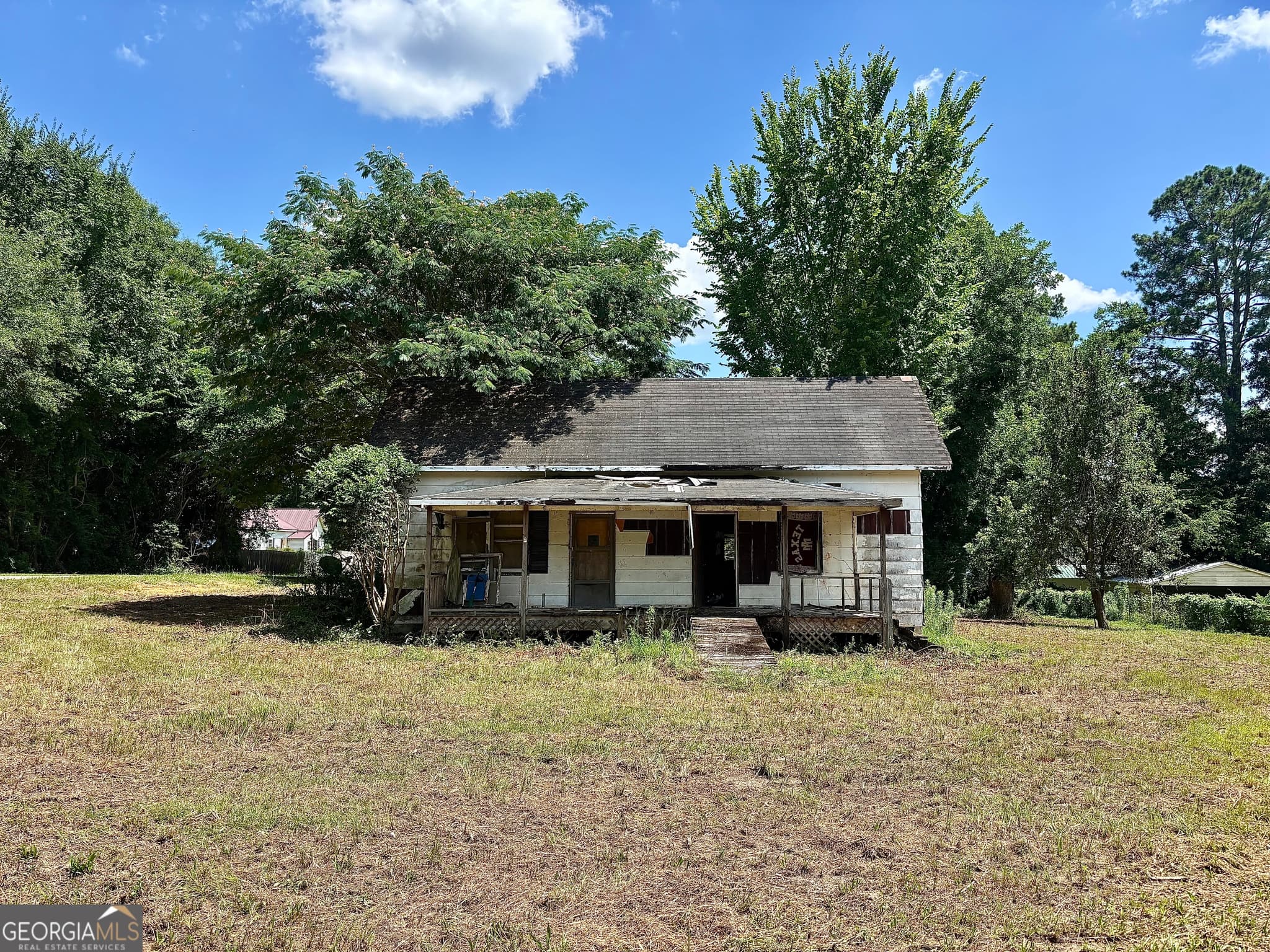 3 bedroom, 1 bathroom, 1,556 sq ft single family residence for sale at 30 Potterville Main Street, Reynolds, GA 31076 — photo 1 of 2