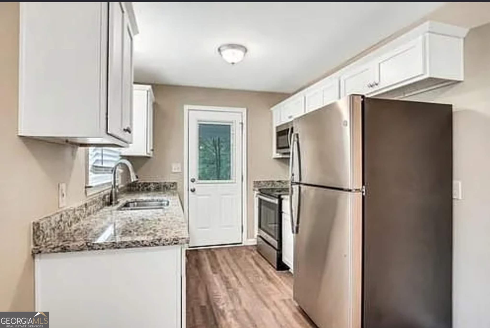 3 bedroom, 1 bathroom, 1,083 sq ft single family residence for sale at 6263 Green Acres Drive, Covington, GA 30014 — photo 3