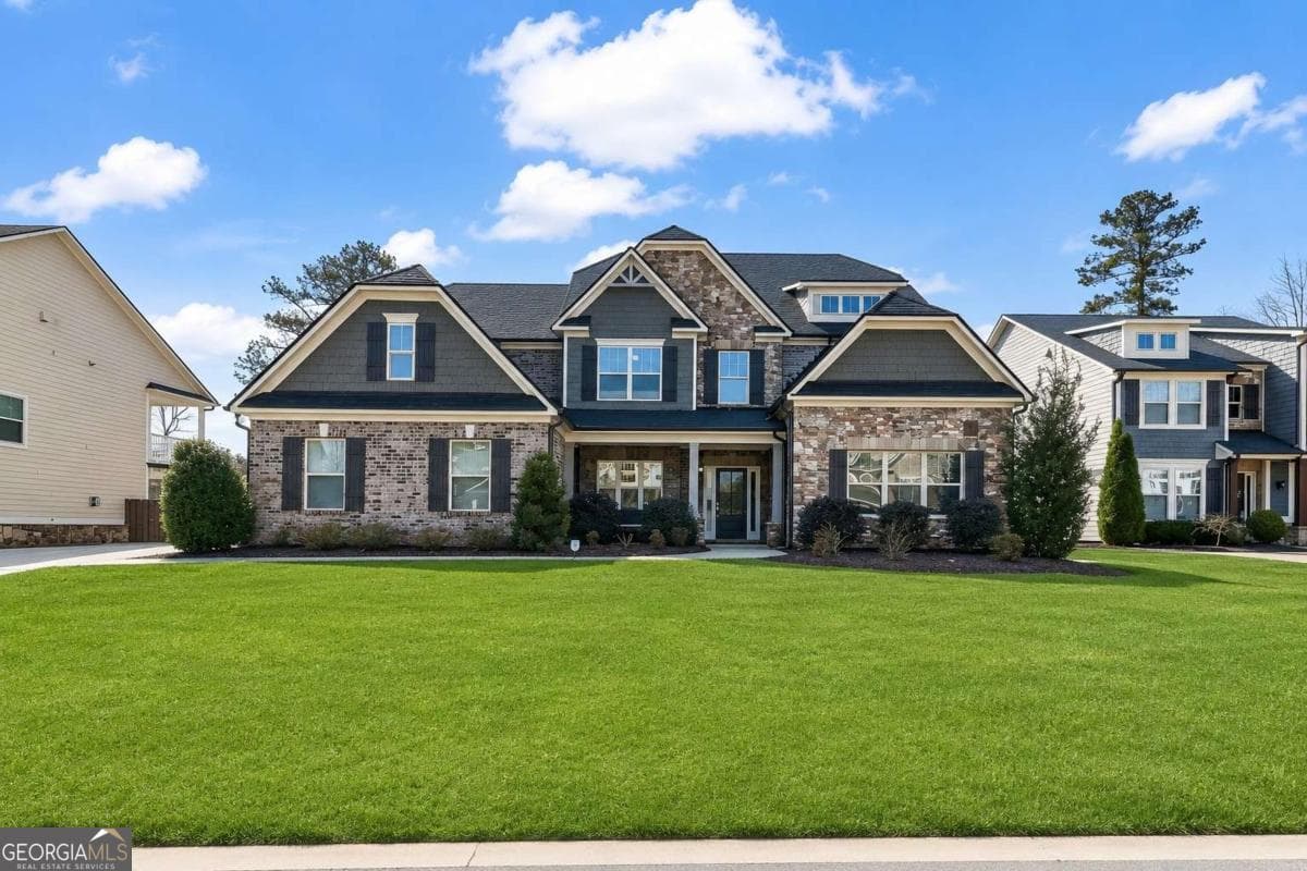 6 bedroom, 3.5 bathroom, 4,235 sq ft single family residence sold at 504 Taymack Farm Court, Woodstock, GA 30188