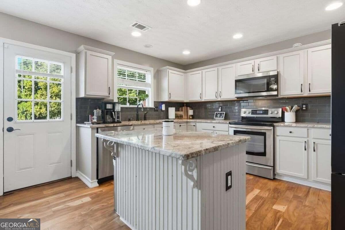 5 bedroom, 3.5 bathroom, 4,162 sq ft single family residence for sale at 2506 Betty Sue Drive, Buford, GA 30519 — photo 10
