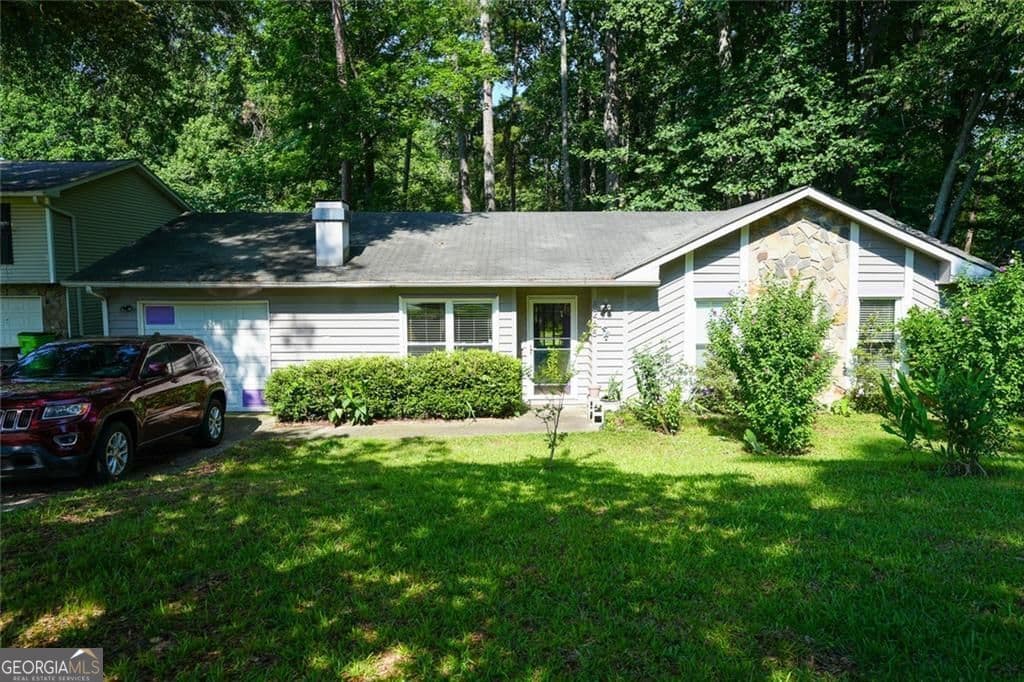 3 bedroom, 2 bathroom, 1,280 sq ft single family residence for sale at 8265 Park Ridge Drive, Riverdale, GA 30274 — photo 1 of 22