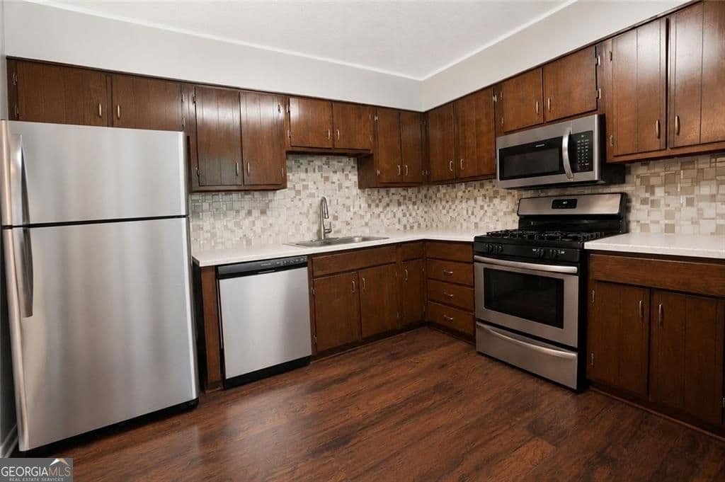 3 bedroom, 2 bathroom, 1,280 sq ft single family residence for sale at 8265 Park Ridge Drive, Riverdale, GA 30274 — photo 4