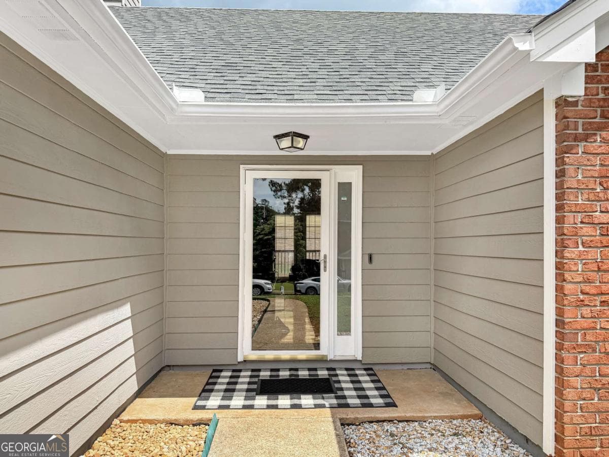 3 bedroom, 2 bathroom, 1,663 sq ft single family residence for sale at 1435 Wheatfield Drive, Lawrenceville, GA 30043 — photo 2