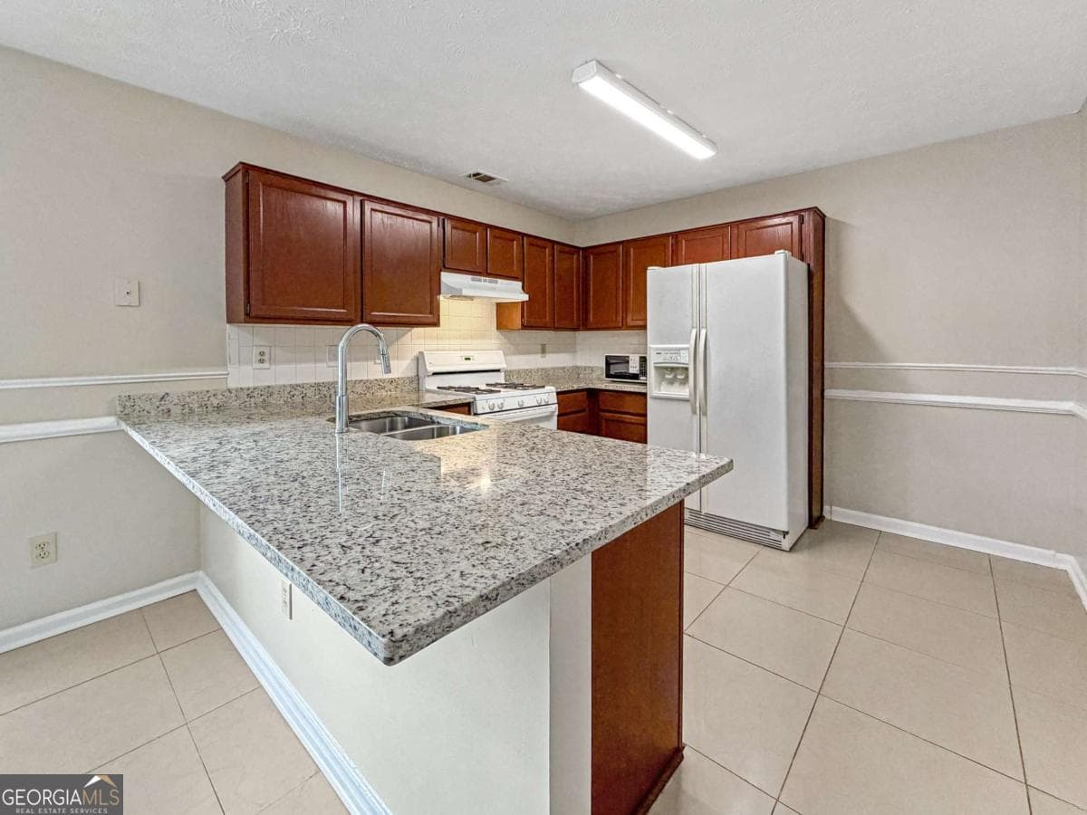 3 bedroom, 2 bathroom, 1,663 sq ft single family residence for sale at 1435 Wheatfield Drive, Lawrenceville, GA 30043 — photo 10