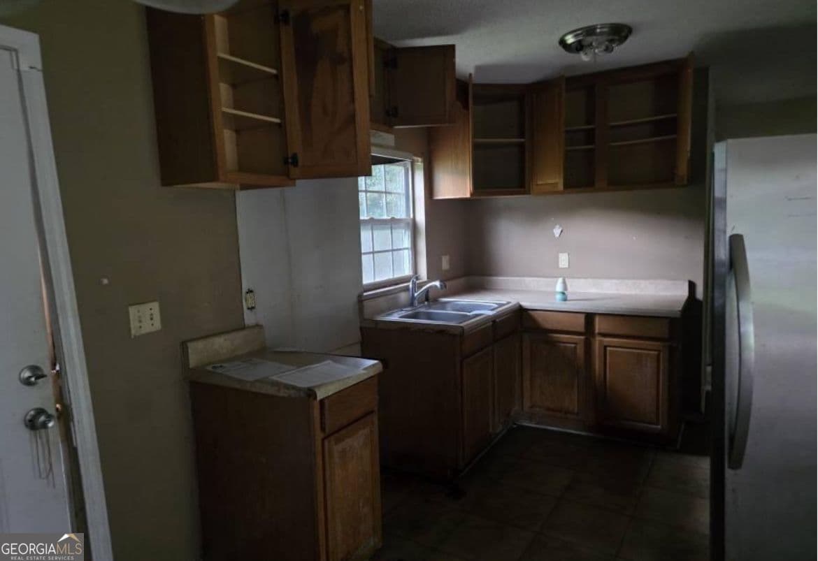 4 bedroom, 2 bathroom, 1,125 sq ft single family residence under contract at 64 Henry Street, Camilla, GA 31730 — photo 5