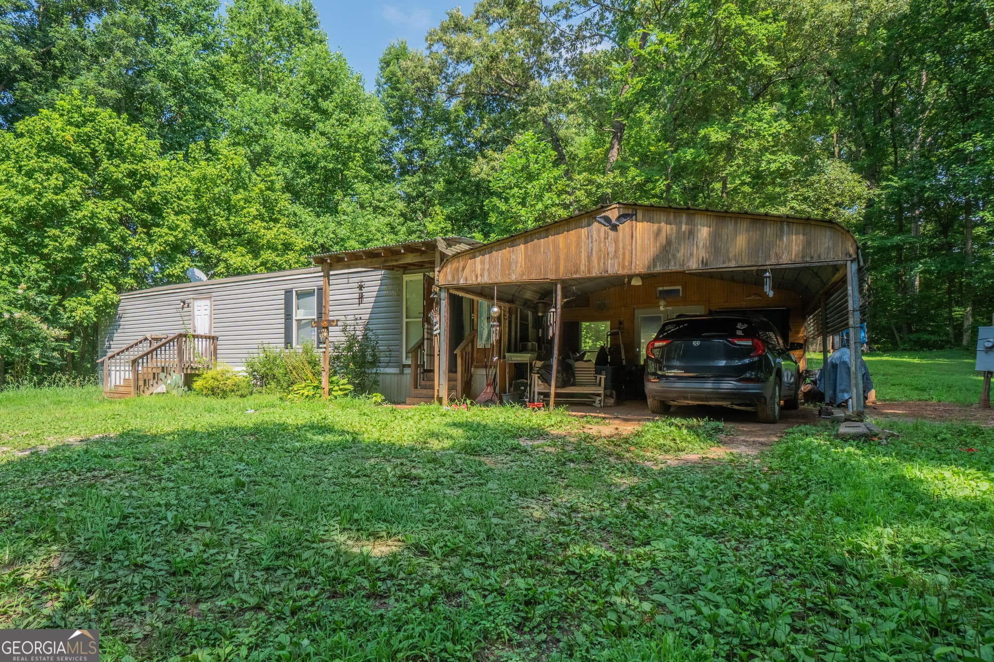 1 bedroom, 1 bathroom manufactured home,single family residence for sale at 157 Neal Valley Lane, Commerce, GA 30530 — photo 2