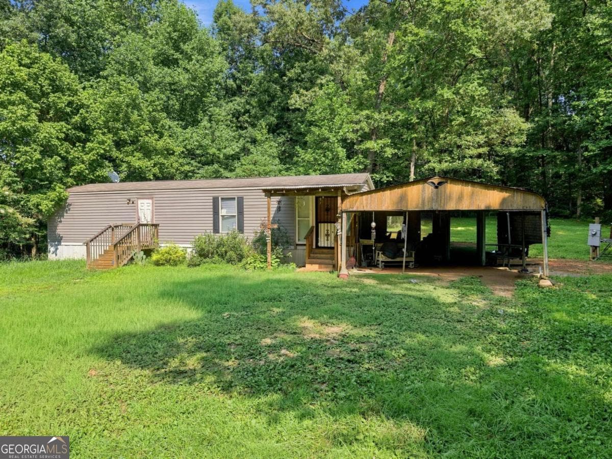 1 bedroom, 1 bathroom manufactured home,single family residence for sale at 157 Neal Valley Lane, Commerce, GA 30530 — photo 4
