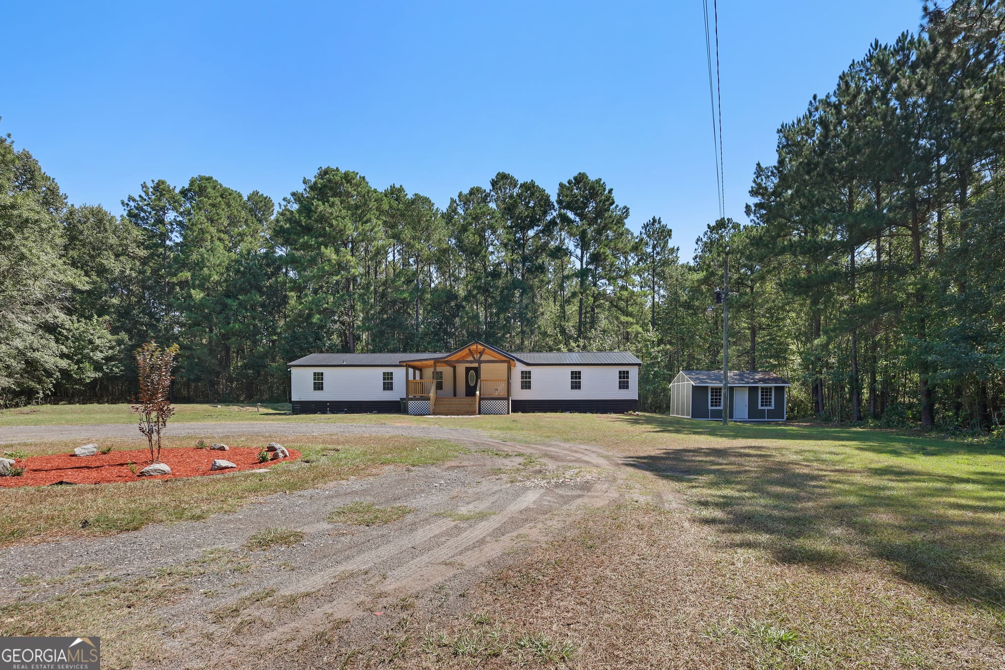5 bedroom, 3 bathroom, 2,128 sq ft single family residence for sale at 2458 Cecil Nobles Highway, Ludowici, GA 31316 — photo 2