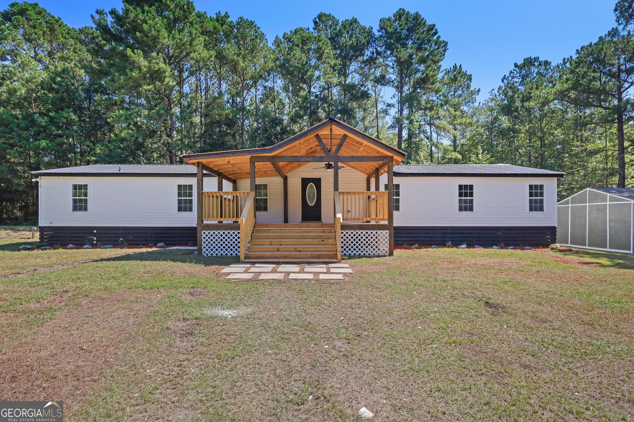 5 bedroom, 3 bathroom, 2,128 sq ft single family residence for sale at 2458 Cecil Nobles Highway, Ludowici, GA 31316 — photo 1 of 26