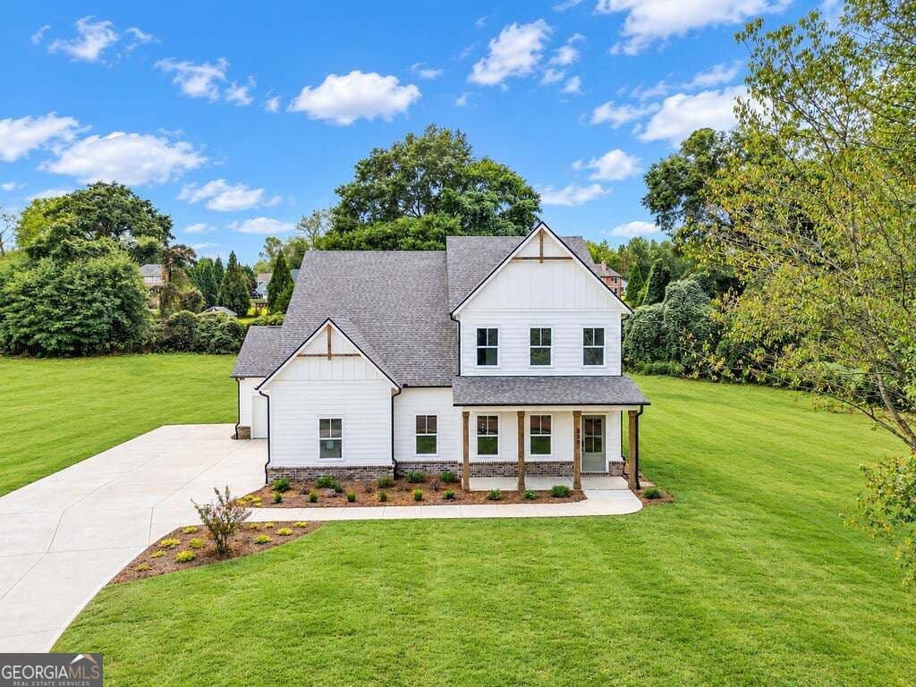 4 bedroom, 3.5 bathroom, 3,331 sq ft single family residence for sale at 328 Races Road, Hoschton, GA 30548 — photo 1 of 86