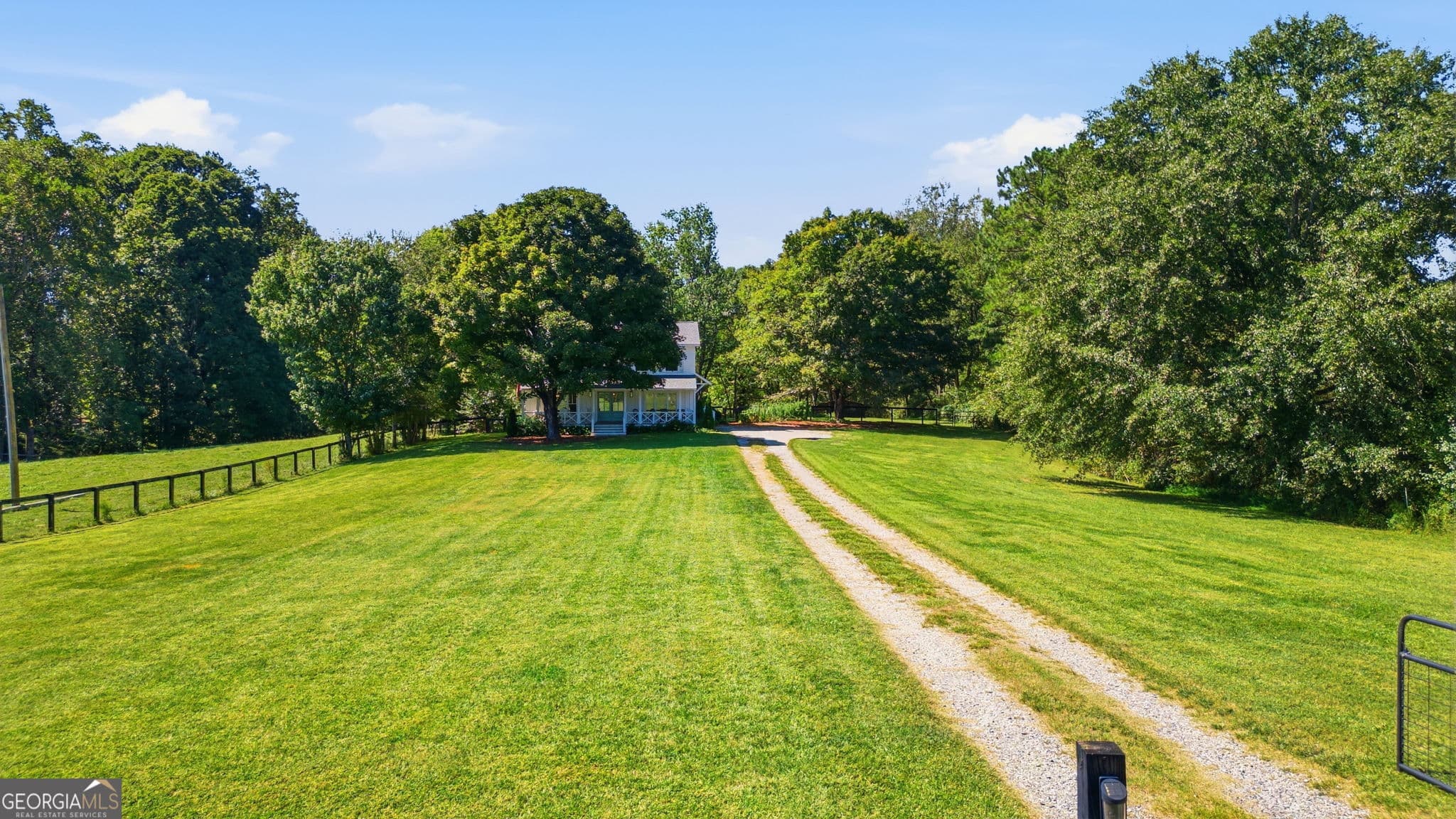 4 bedroom, 2.5 bathroom, 2,442 sq ft single family residence for sale at 5425 Howard Road, Cumming, GA 30040 — photo 3