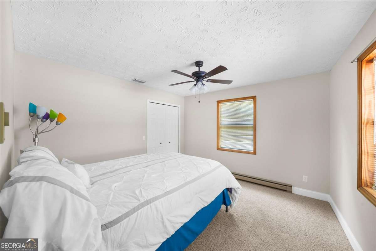 4 bedroom, 3 bathroom, 2,202 sq ft single family residence for sale at 9670 Lee Circle, Gainesville, GA 30506 — photo 9